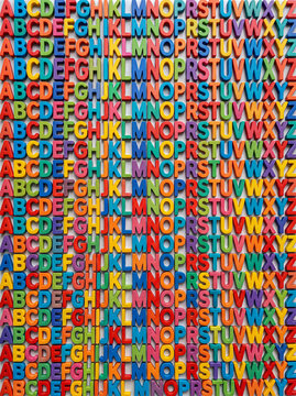  Rows of colorful plastic alphabet letters from A to Z