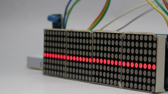 Vibration sensor module detects motion from manual tapping and converts the signal into a visual pattern of red dots on a matrix display