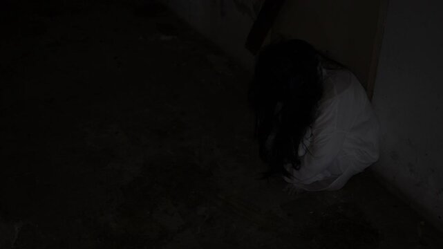 Ghostly woman in white stands in a dark abandoned corridor. Concept of horror, fear, supernatural mystery, haunted place, nightmare, paranormal activity, and scary atmosphere.