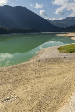 Lake, mountain lake, mountains, reflection, sunny, drought, low water, drought, climate change, back light, August 2026, Sylvenstein Dam, Sylvensteinsee, Isar, Lenggries, Bavarian Alps, Bavaria, Germany