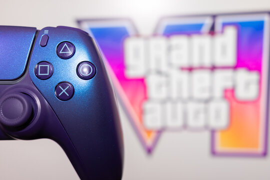 YEREVAN, ARMENIA - 08.11.2026: Sony PlayStation 5 DualSense controller with the official Grand Theft Auto VI artwork and logo in the background