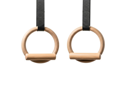 Wooden gymnastic rings hanging with black straps for exercise