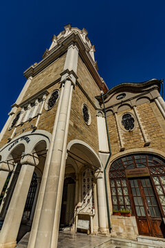 Arafed view of a large building with a clock tower, Svishtov, Bulgaria, Saint Trinity church