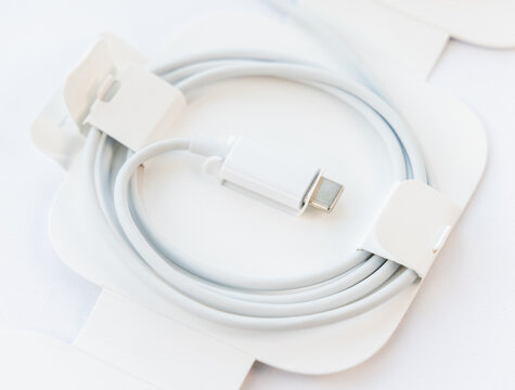 White USBC Cable Neatly Coiled in its Minimalist Packaging