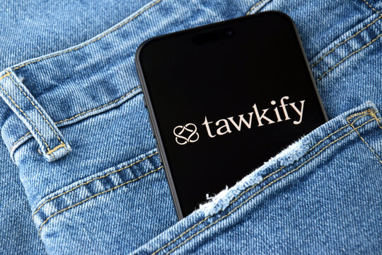 Tawkify dating app on smartphone screen.