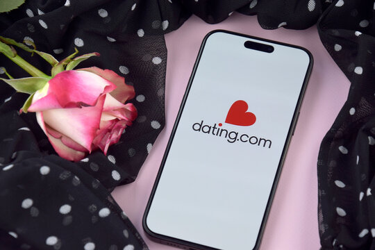 Datingcom dating app on smartphone screen.