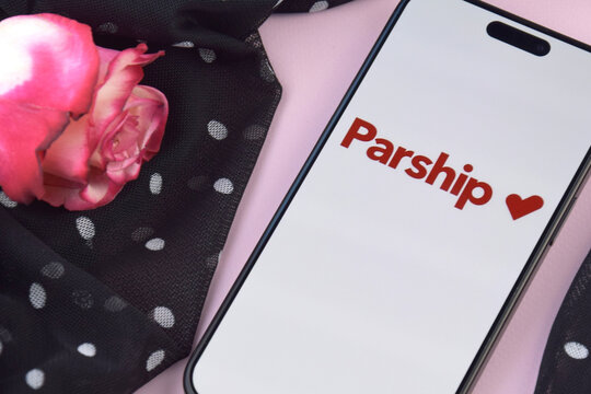 Parship dating app on smartphone screen.