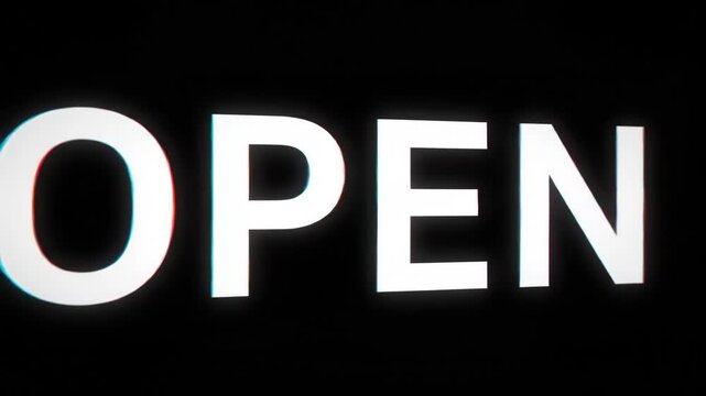 The word open displayed with a digital glitch effect and chromatic aberration on a black background.