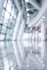 Fototapeta premium Abstract blurred interior view of a modern architectural space with large windows and polished floor reflections