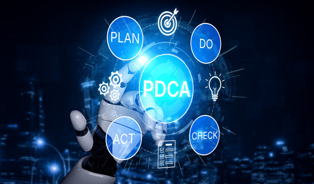 Futuristic Automation Concept with Robotic Hand Interacting with PDCA Cycle Elements for Continuous Improvement and Business Development. Bitwise.