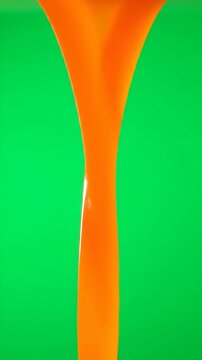 Abstract stream of vibrant orange liquid pouring against a bright green background.