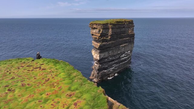 Downpatrick Head in Ireland at Sunny Day, Aerial Drone Shot. Stunning High Cliffs, Dun Briste Irish Coastal Landmark.