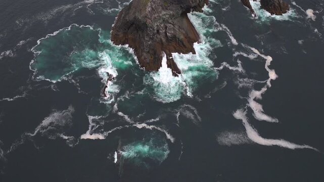 Kerry Cliffs at Cloudy weather Aerial Shot. Dramatic Rocks on the West Ocean Coast in Kerry County, Portmagee, Ireland