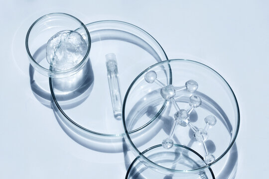 Laboratory glassware with molecular model for scientific research