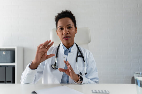 Female physician presenting medical information during an online webinar. Health education, telehealth, patient awareness and digital healthcare communication concept