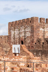 View of the castle walls in the ancient town of Silves in the Algarve, Portugal © smartin69