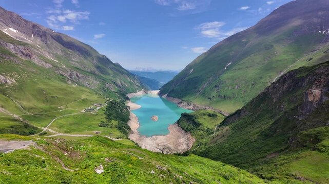 Kaprun Alpine Reservoir And Dam Surrounded By Mountains

Kaprun reservoir and dam surrounded by green Alpine mountains, Austria, 11 August 2026.
