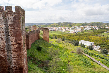 Fototapeta premium Aerial view of the ancient town and castle walls of Silves in the Algarve, Portugal