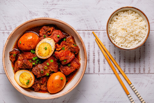 Braised pork belly and eggs. Traditional Southeast Asian cuisine