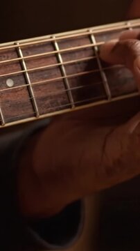 Capturing the Art of Playing Guitar: A Close-Up on Fingering and Crafted Strings in a Melodic Performance