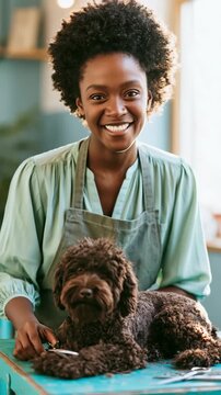 Happy groomer smiling with a relaxed brown doodle dog on a grooming table in a bright salon for pet care banner and background