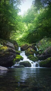 Fresh waterfall along the Salat river in Ariege department in southwest France. Trout fishing