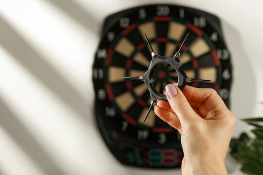 Darts game close-up with copy space &ndash; entertainment and leisure concept.