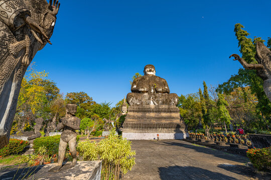 Nong Khai Thailand,28 June 2026. Striking mythological sculpture at Wat Khaek, featuring a towering multi-headed serpent and guardian figure inspired by Buddhist and Hindu spiritual traditions.