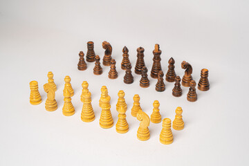 Detailed wooden chessboard and carved game pieces © nayefhammouri
