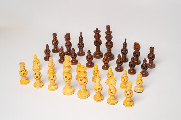 Traditional chess set with carved wooden pieces © nayefhammouri
