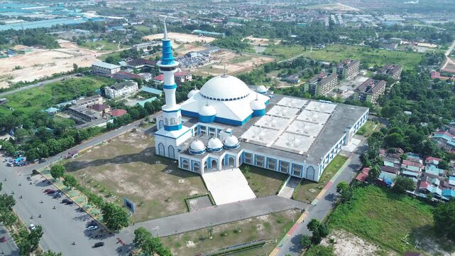Aerial view of Sultan Mahmud Riayat Syah Mosque with modern Islamic architecture in Batam, Indonesia