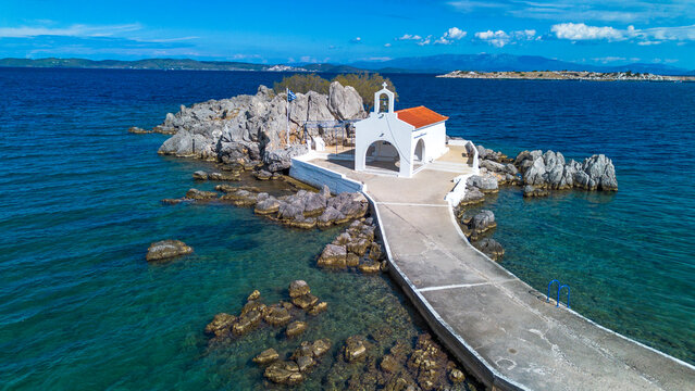 Aerial Drone View of Agios Isidoros Chapel on a Rocky Islet in Chios Greece