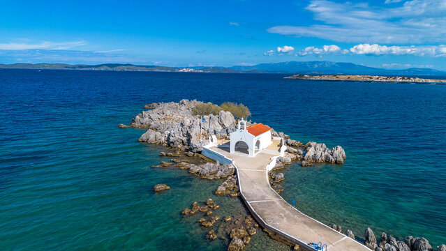 Aerial Drone View of Agios Isidoros Chapel on a Rocky Islet in Chios Greece