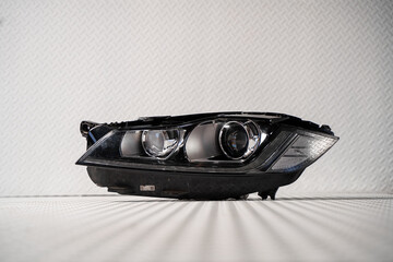 Modern LED car headlight isolated on white background © nayefhammouri