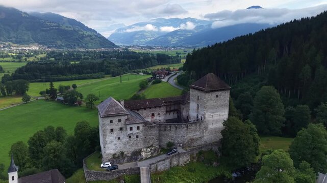 
Aerial View Of Historic Kaprun Castle Austrian Alps

Drone footage of Kaprun Castle and surrounding Alpine village, Austria, 11 August 2026.

