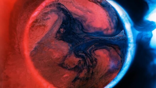 Mixing different colors of alcohol ink in a close-up view
