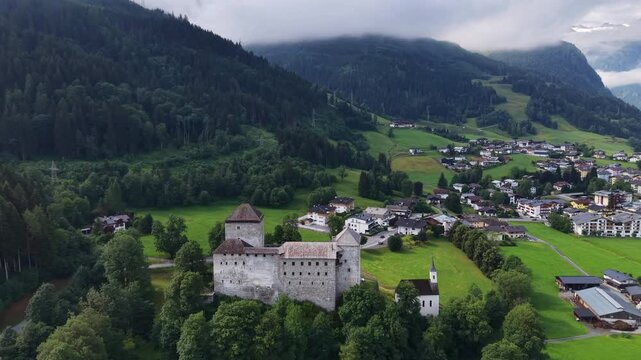 
Aerial View Of Historic Kaprun Castle Austrian Alps

Drone footage of Kaprun Castle and surrounding Alpine village, Austria, 11 August 2026.

