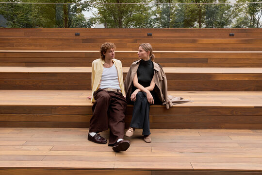 Stylish couple enjoys a casual autumn date in the heart of the city