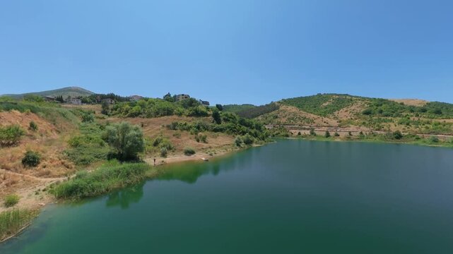  Drone View around a mountain pond