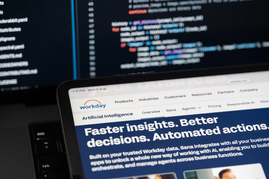 Workday Ai company web page on program code background