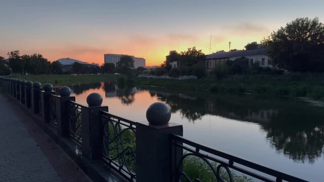 By the river at sunset