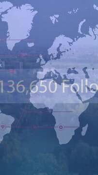 Animation of increasing followers on speech bubble over world map against aerial view of cityscape
