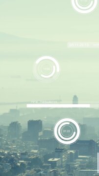 Animation of data processing against aerial view of cityscape