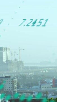 Animation of data processing against aerial view of cityscape