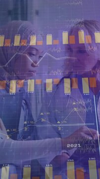 Analyzing data on tablet, healthcare professionals with medical chart animation