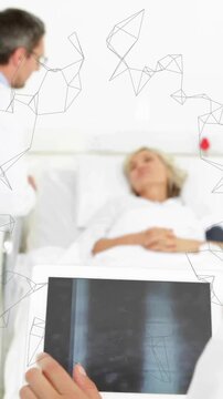 Doctors reviewing X-ray on tablet with medical data animation over hospital scene