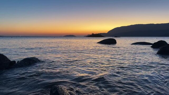Wonderful sunset at Juli&atilde;o Beach in Ilhabela, S&atilde;o Paulo, Brazil.