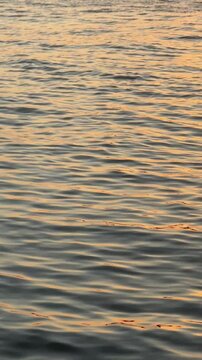 Closeup of the sea at sunset