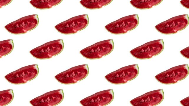 Red watermelon placed in a repeating pattern on a white background