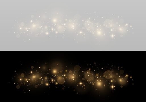 Golden glitter particles with glowing bokeh, bright sparkles and luminous highlights.